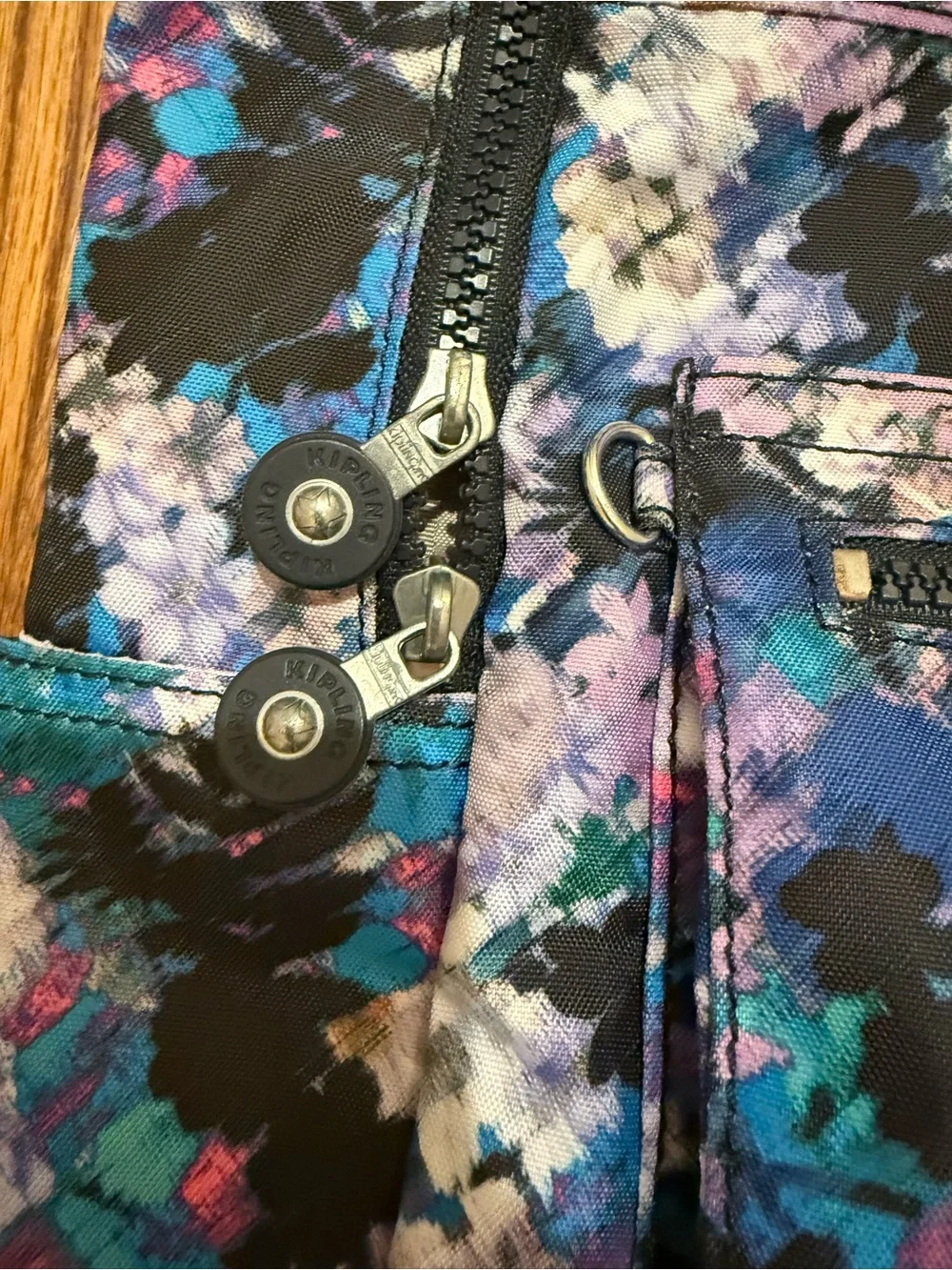Kipling Floral Backpack in Black, Blue & Purple